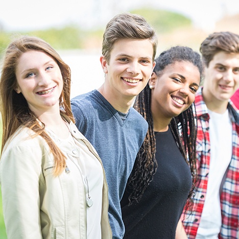 group of teens smiling